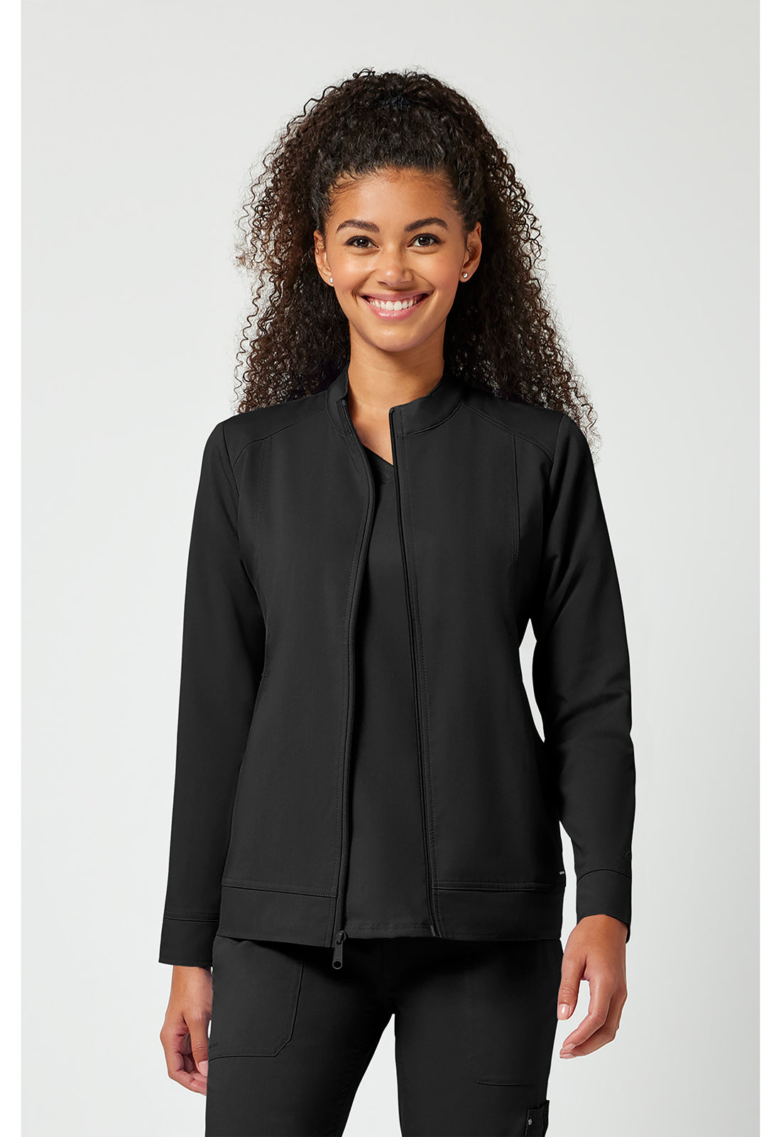 Woman wearing a black jacket on a white background