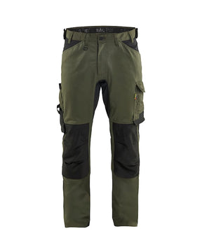 Green and black work pants on a white background