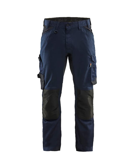Navy blue work pants with black knee pads on a white background