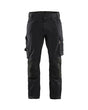 Black cargo pants with multiple pockets on a white background