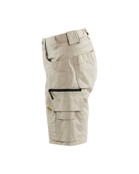 Beige cargo shorts on a white background