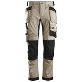 Front view of Snickers U6241 black slim fit stretch work pants with holster pockets
