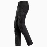 Side view of women's flexible cargo work pants showing the ergonomic pre-bent knees and slim fit design.