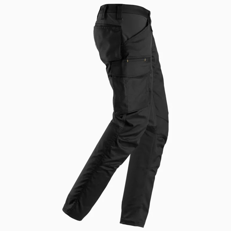 Side view of women's flexible cargo work pants showing the ergonomic pre-bent knees and slim fit design.