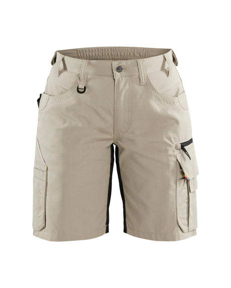 Beige cargo shorts with multiple pockets on a white background