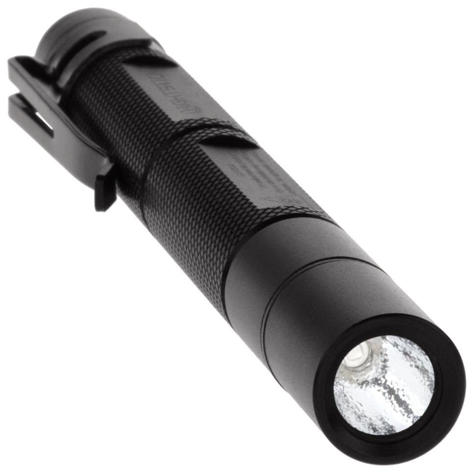 The NightStick MTU-106 illuminating hidden security markings on a document using its 365nm UV beam.